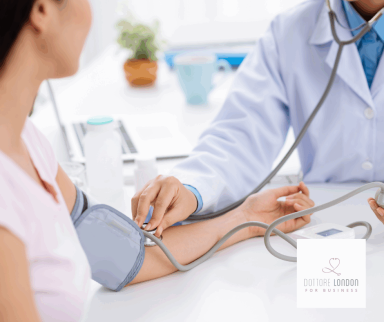 Doctor checking blood pressure during a corporate health screening – Dottore London for Business